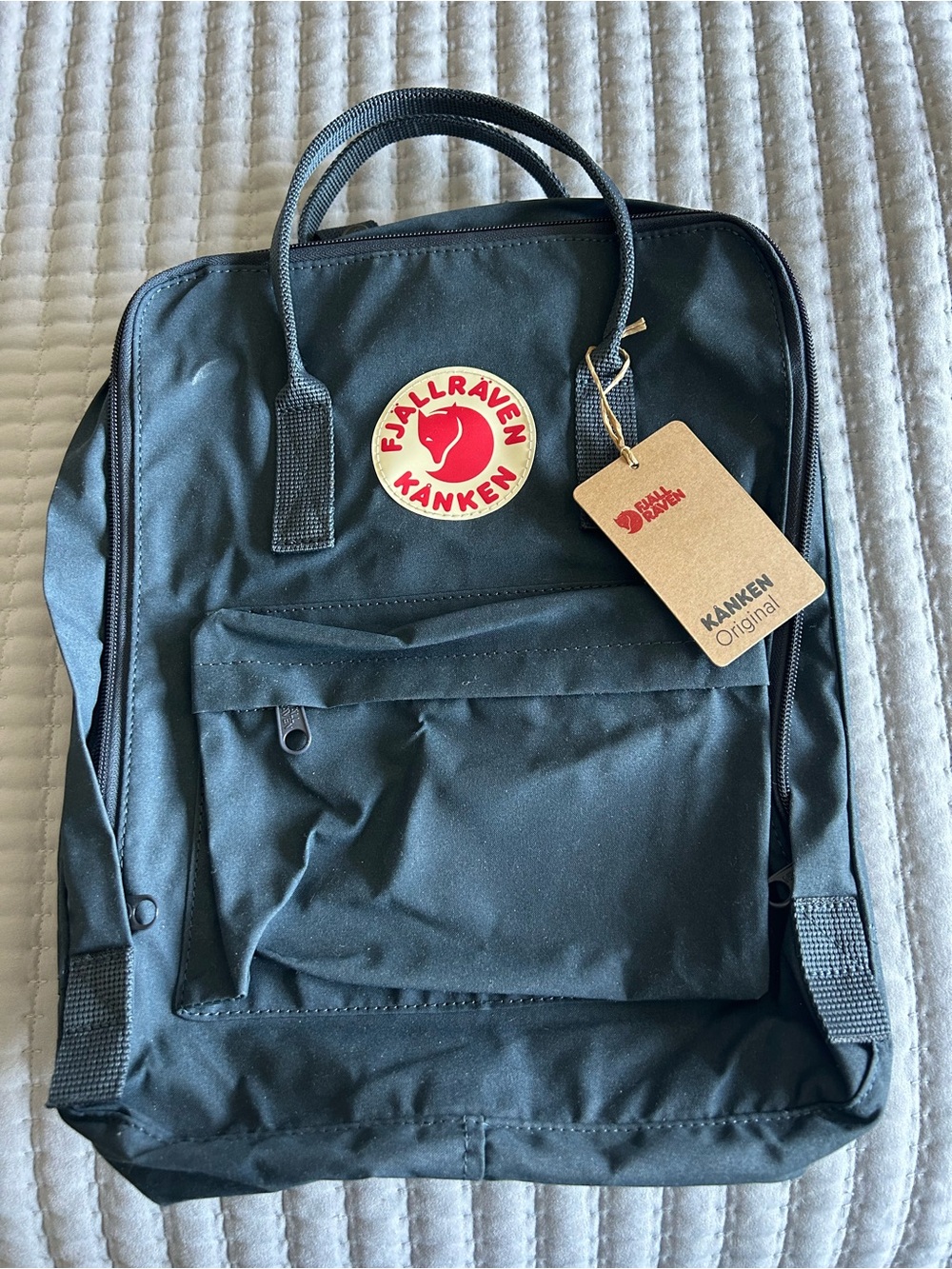 Fjallraven Kanken Slim Backpack in Black with Red Logo